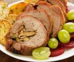 10667346-roasted-turkey-roulade-with-potatoes-beet-and-grapes-shallow-dof