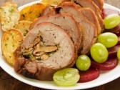 10667346-roasted-turkey-roulade-with-potatoes-beet-and-grapes-shallow-dof