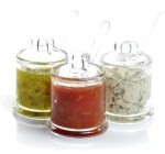 12197010-various-dips-in-glass-jars-on-white-background